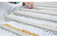 FOTO/VIDEO - O fabrică unde erau produse şi ambalate clandestin ţigări a fost descoperită în judeţul Dolj