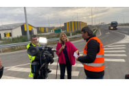 Un angajat al CNAIR, Alin Şerbănescu, îşi permite să perturbe transmisia în direct a postului Realitatea Plus de pe podul de la Brăila